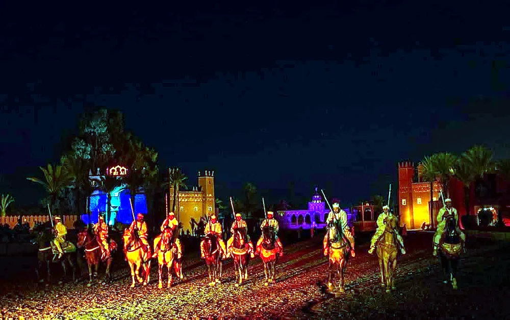 Fantasia horsemen firing muskets at Chez Ali Marrakech
