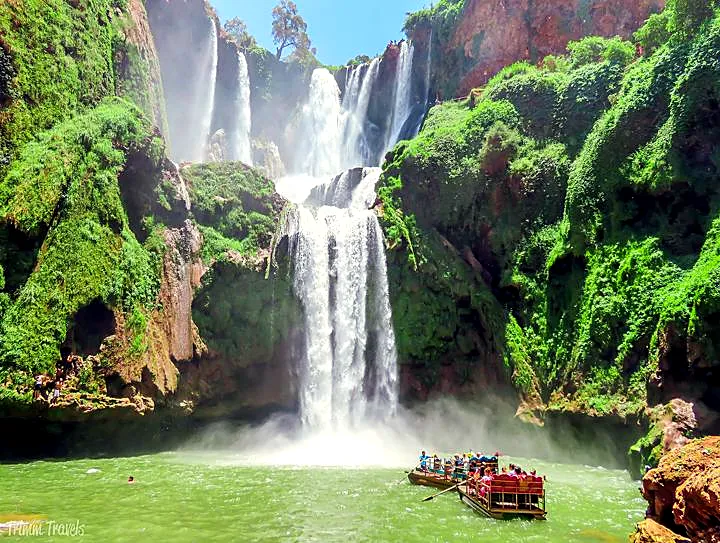 Rainbow mist rising from the Ouzoud waterfall pool